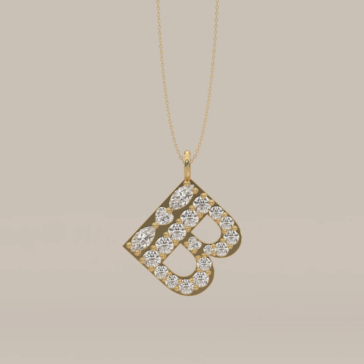 Letter B Initial Pendant with Mixed Cut Lab Grown Diamonds in yellow gold, shown at an angle.