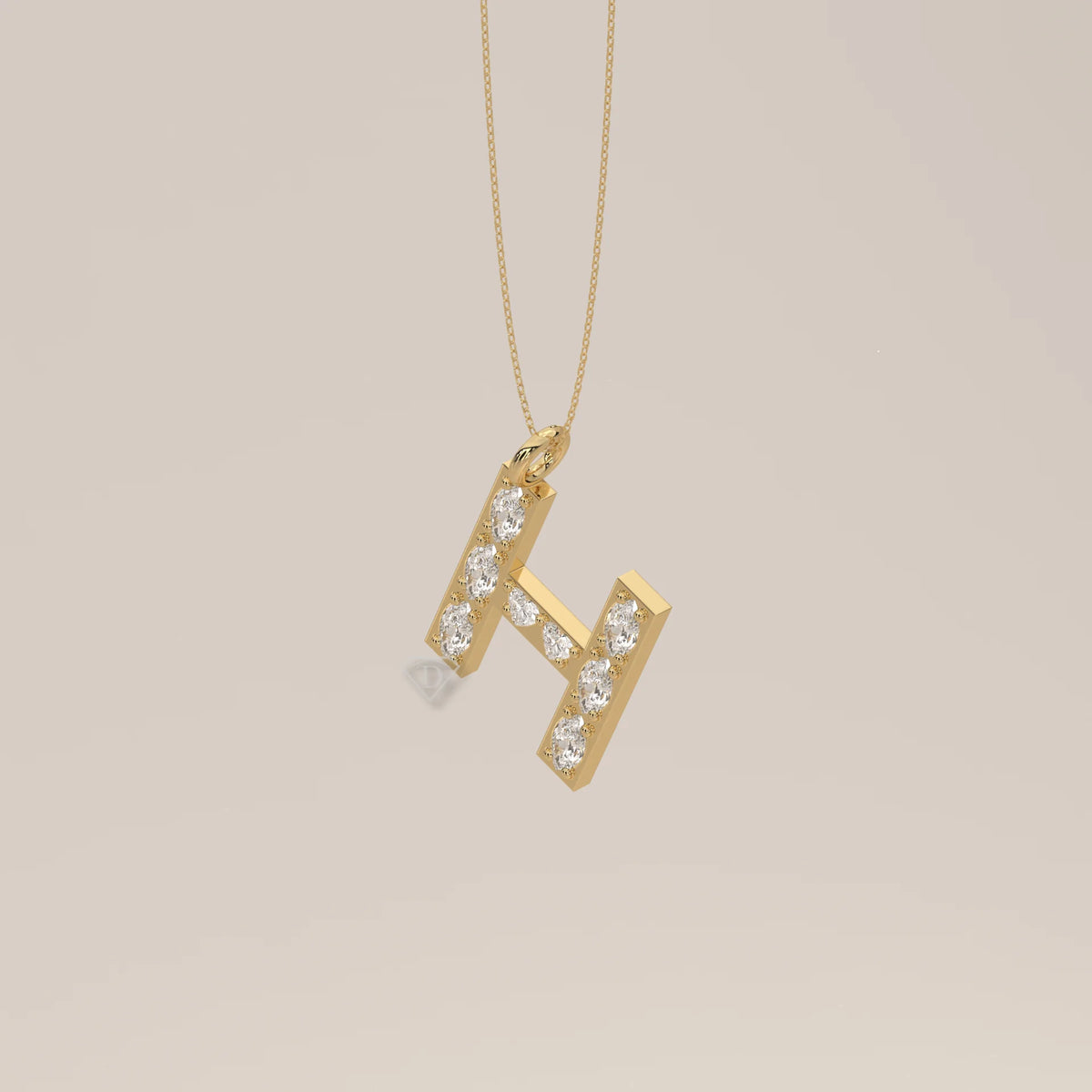 Letter H Initial Pendant with Marquise Lab Grown Diamonds in yellow gold, shown on a plain background.