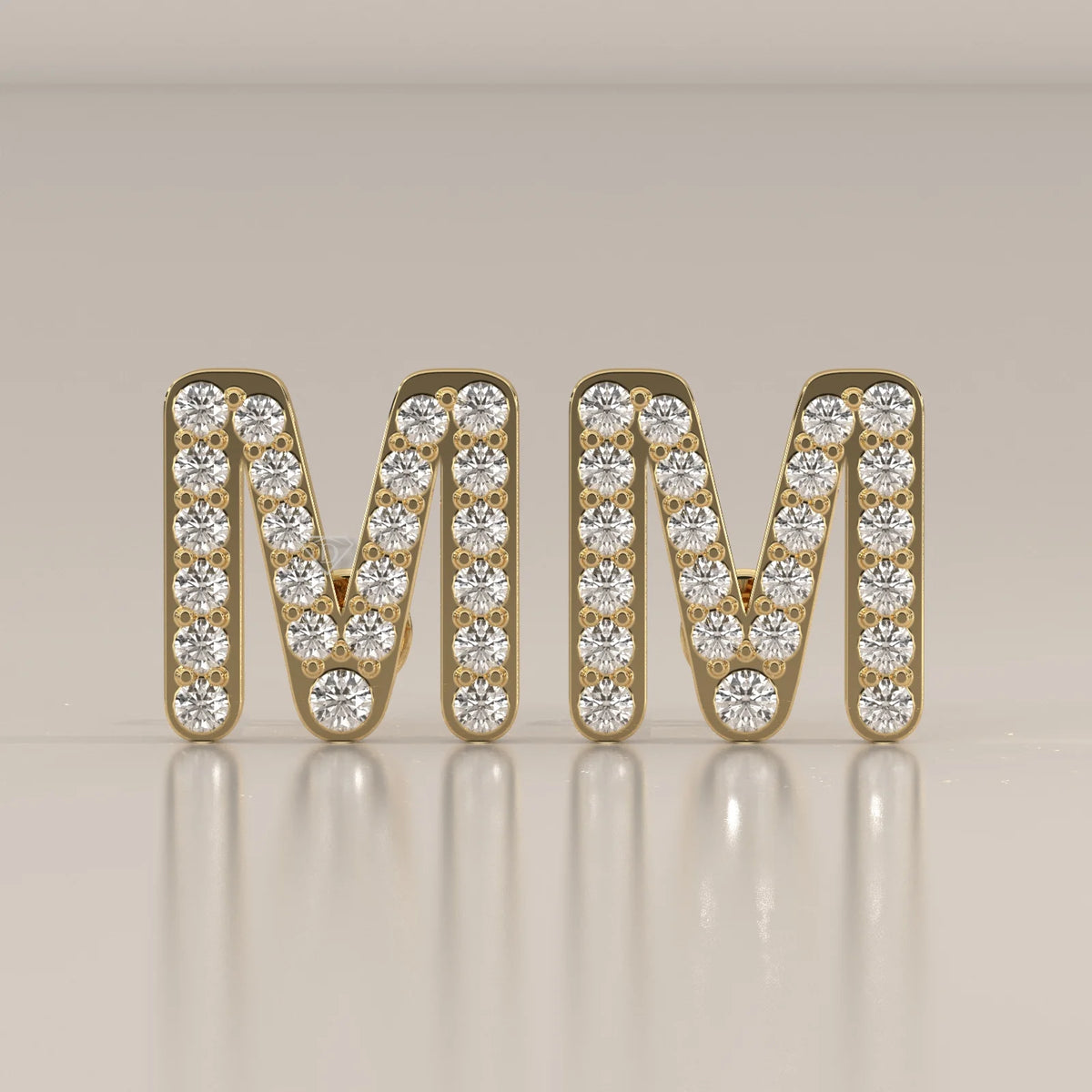 Letter M Initial Pave Lab Grown Diamond Stud Earrings in yellow gold, shown from the front.