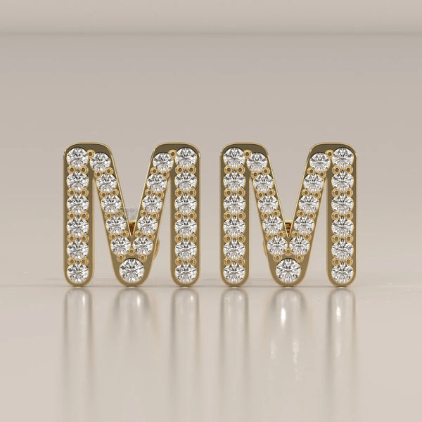 Letter M Initial Pave Lab Grown Diamond Stud Earrings in yellow gold, shown from the front.