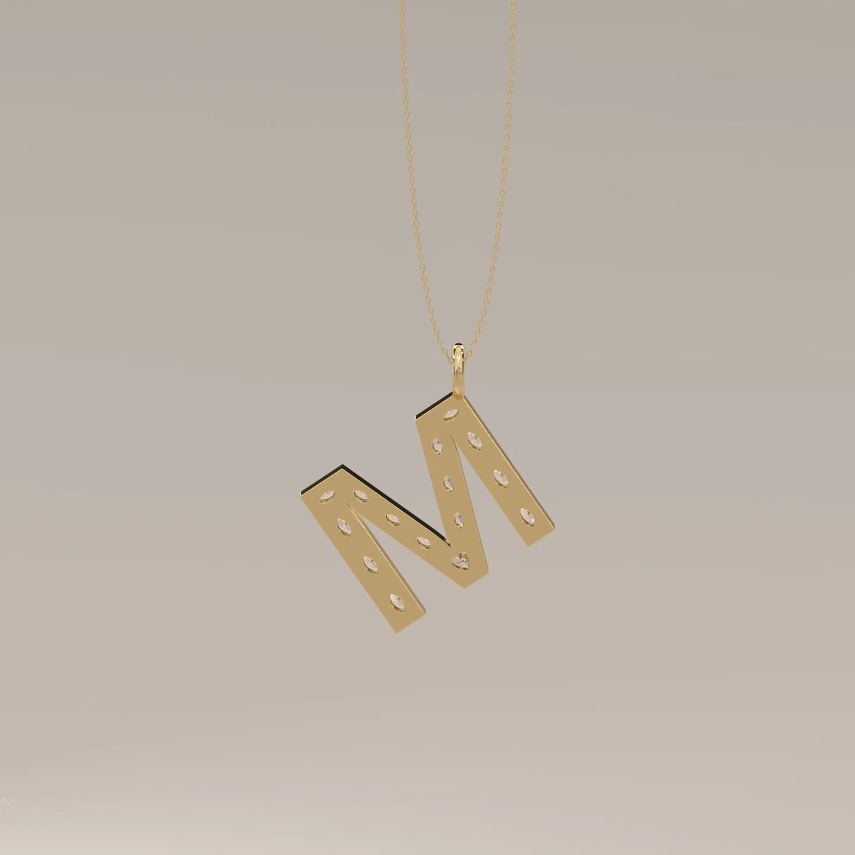 Letter M Initial Pendant with Marquise Lab Grown Diamonds in yellow gold, shown from the front.