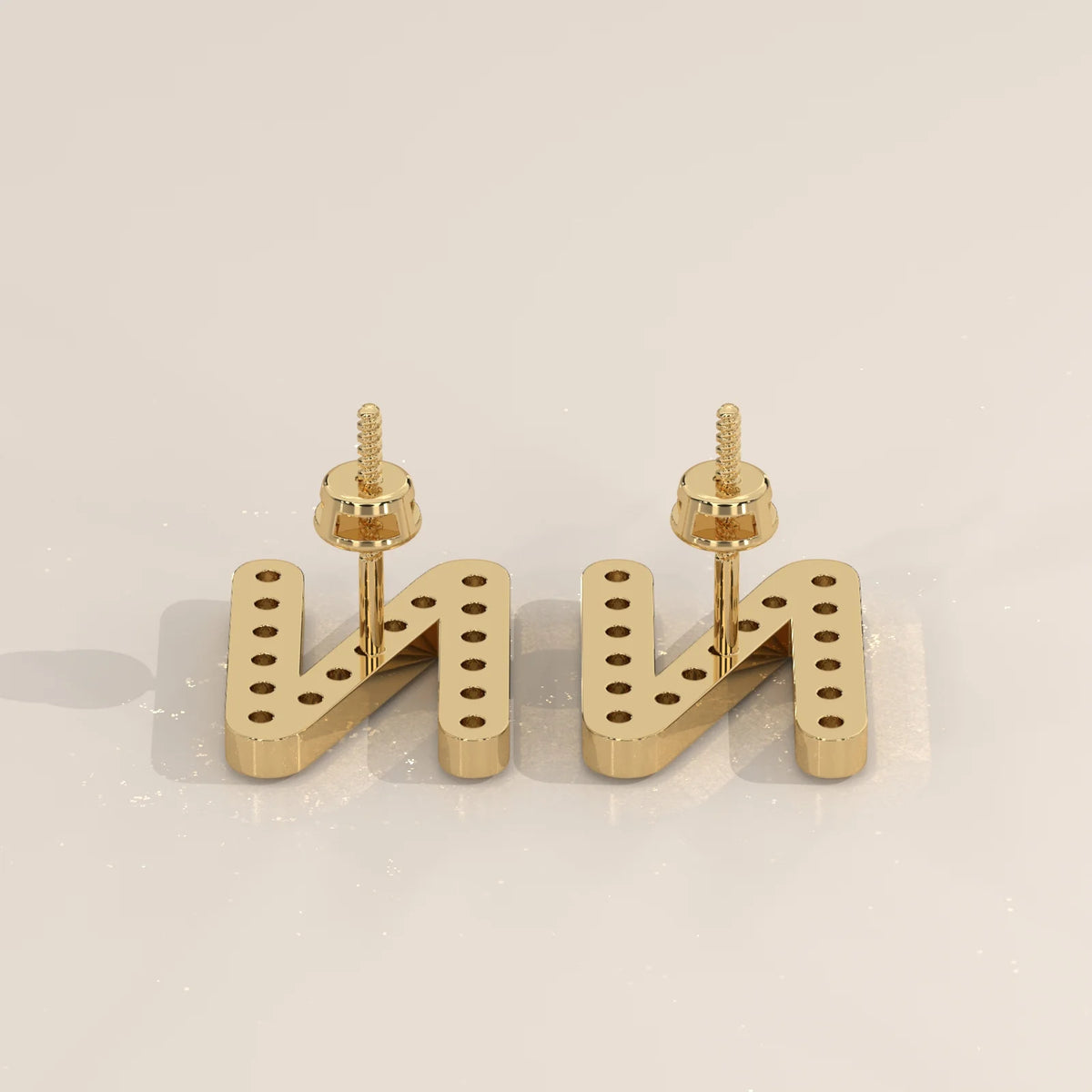 Letter N Initial Pave Lab Grown Diamond Stud Earrings in yellow gold, product photograph on a plain background.