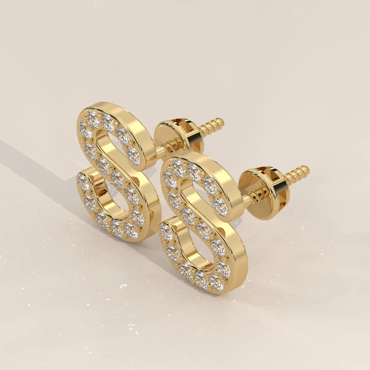 Letter S Initial Pave Lab Grown Diamond Stud Earrings in yellow gold, photographed head-on.
