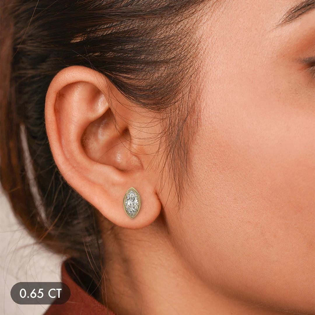 Marquise bezel set lab grown diamond stud earring on model, 0.65 ct single earring (1.3 tcw pair)