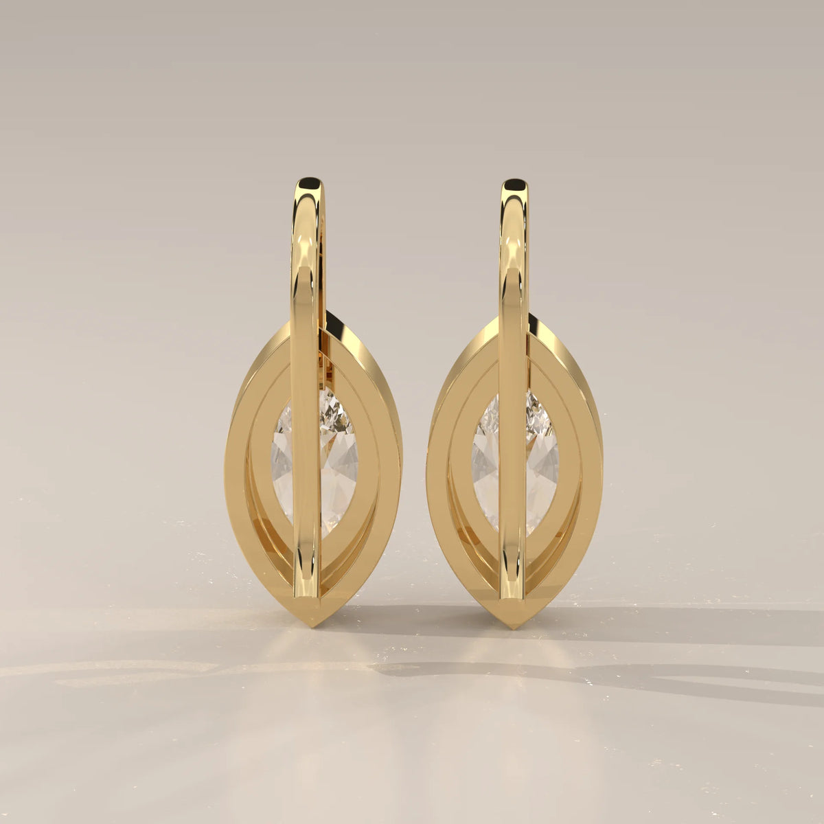 Marquise Bezel Lab Grown Diamond Drop Earrings on a Gold Hook in yellow gold, photographed head-on.