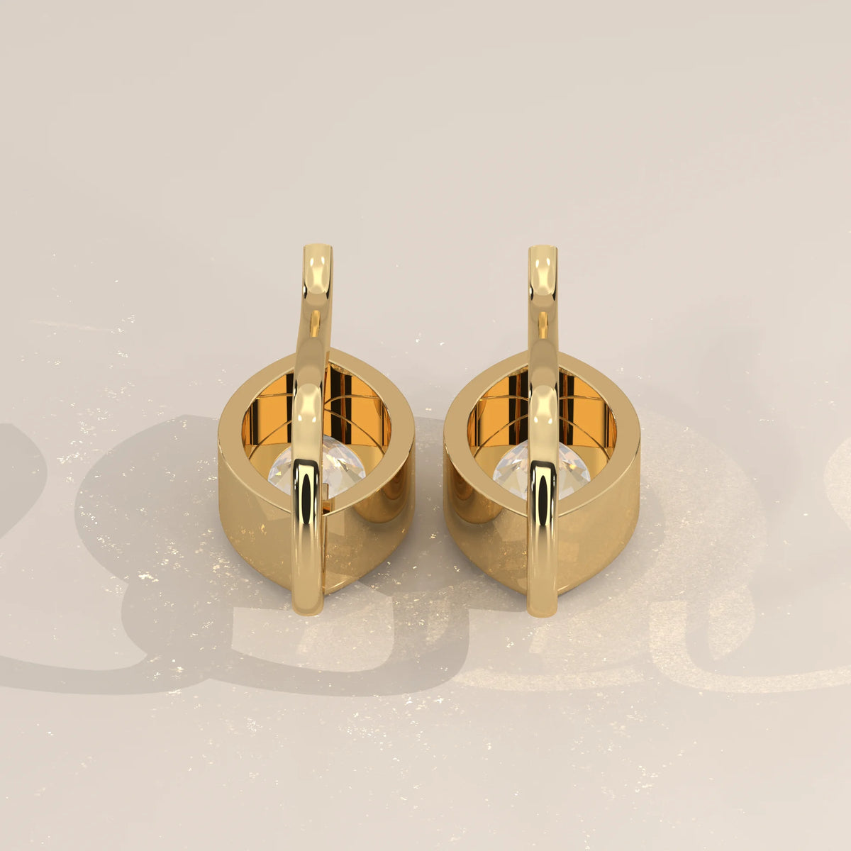 Marquise Bezel Lab Grown Diamond Drop Earrings on a Gold Hook in yellow gold, product photograph on a plain background.
