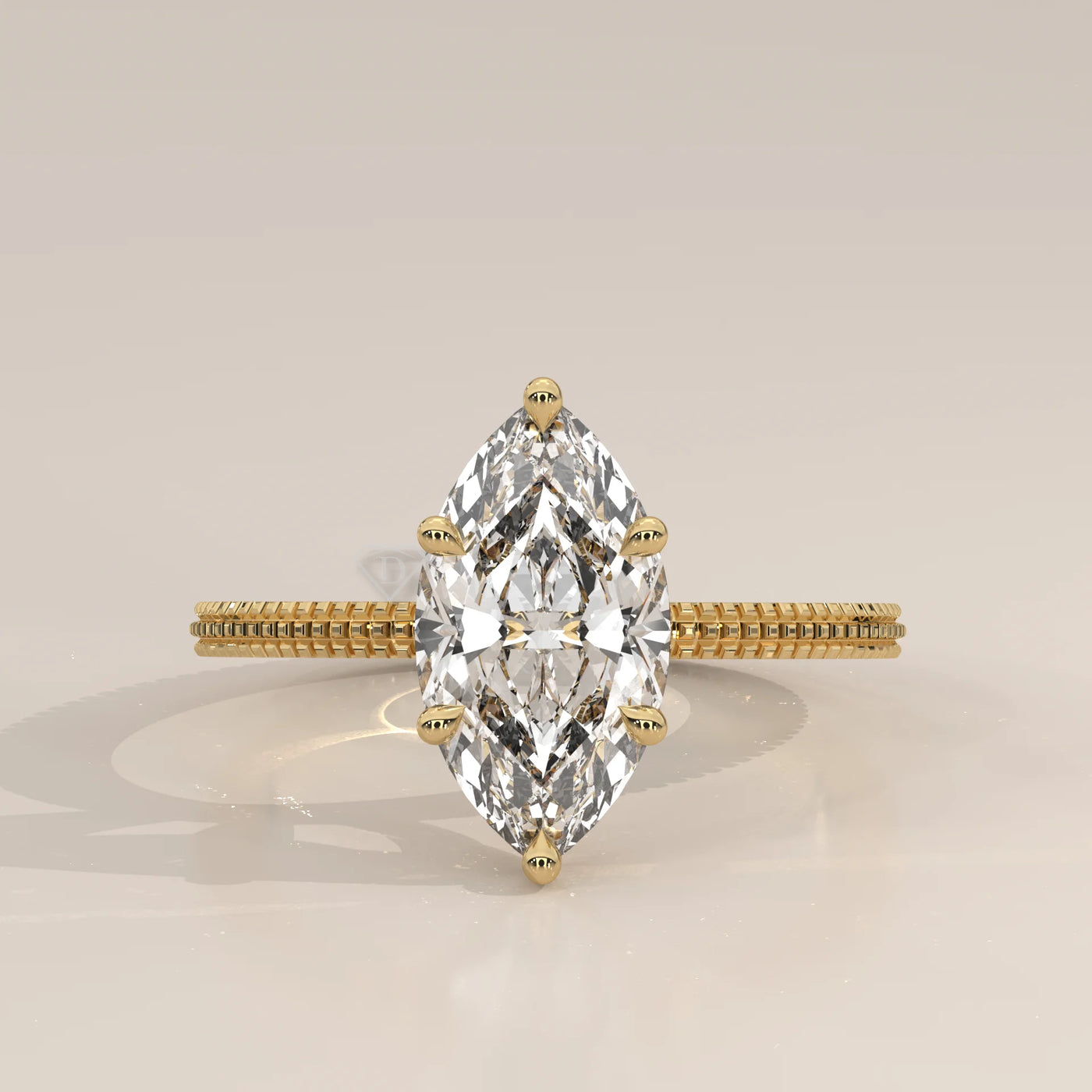 Marquise cut diamond engagement ring in yellow gold.