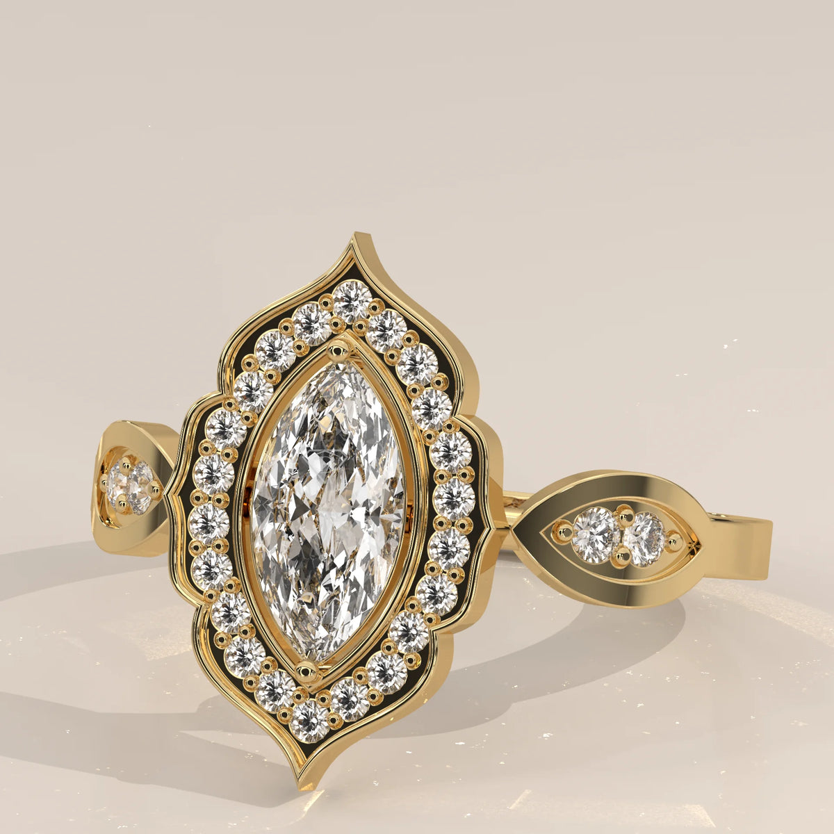 Marquise Lab Grown Diamond Vintage Halo Ring with Almond Shoulders in yellow gold, photographed at a three-quarter angle.