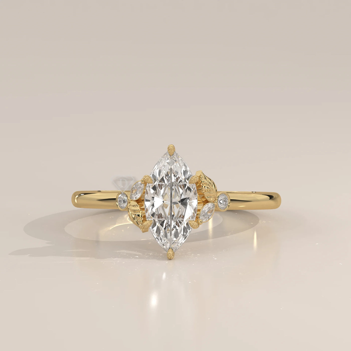 Gold ring with a marquise-cut diamond and accent stones.