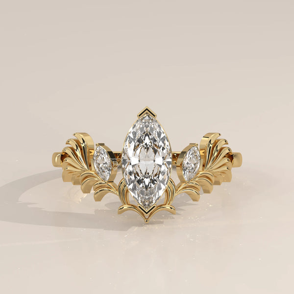 Marquise Lab Grown Diamond Ring with Carved Leaf Wings in yellow gold, photographed head-on.