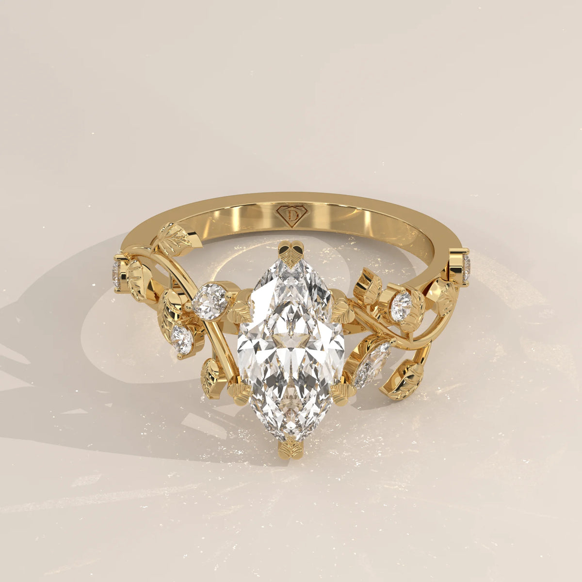 Marquise Lab Grown Diamond Vine Ring with Engraved Leaves in yellow gold, shown from the front.
