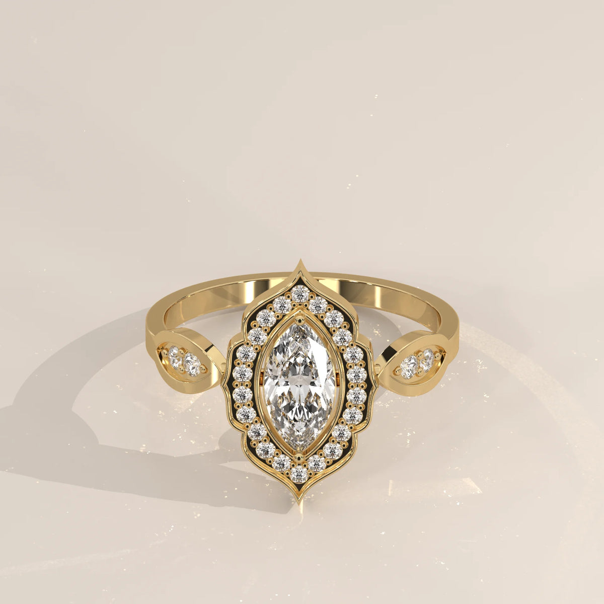 Marquise Lab Grown Diamond Vintage Halo Ring with Almond Shoulders in yellow gold, shown from the front.