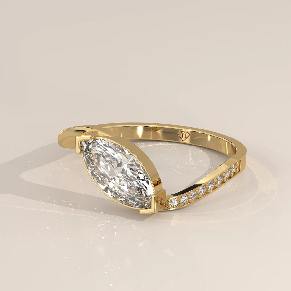 Marquise Lab Grown Diamond East West Half Bezel Bypass Ring in yellow gold, shown from the side.