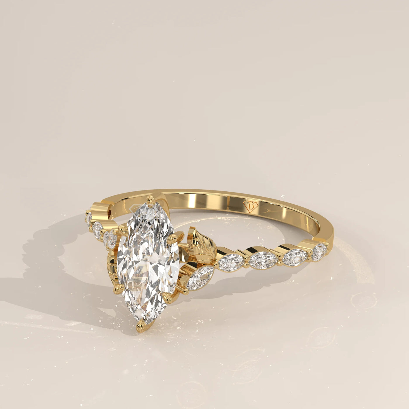 Gold ring with a marquise-cut diamond and ornate band
