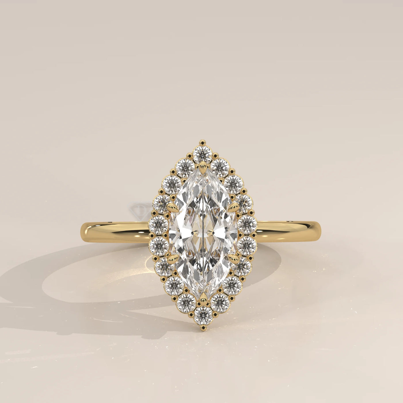 Yellow gold ring featuring a marquise-cut diamond encircled by smaller diamonds.