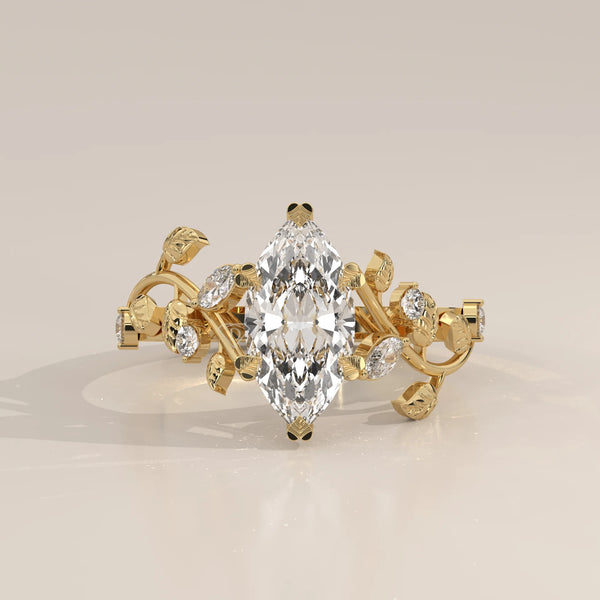Marquise Lab Grown Diamond Vine Ring with Engraved Leaves in yellow gold, photographed head-on.