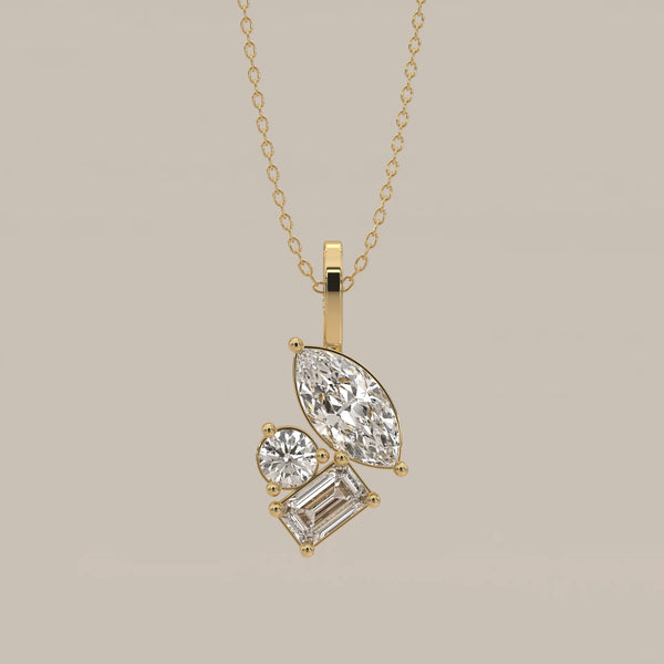 Marquise, Emerald and Round Lab Grown Diamond Cluster Pendant in yellow gold, shown from the front.