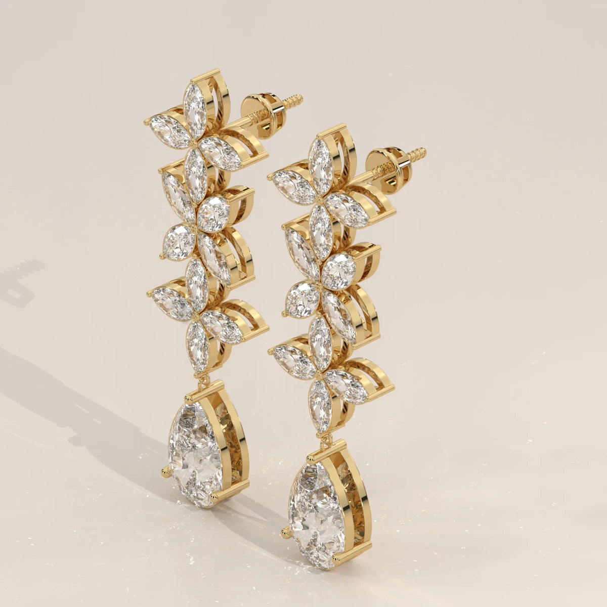 Marquise Flower Cascade Lab Grown Diamond Earrings with Pear Drop in yellow gold, shown on a plain background.