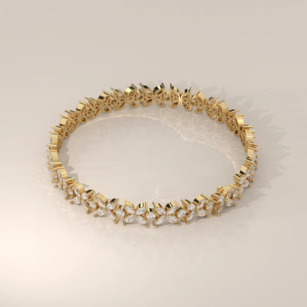 Marquise Flower Lab Grown Diamond Tennis Bracelet with Rounds in yellow gold, shown on a plain background.