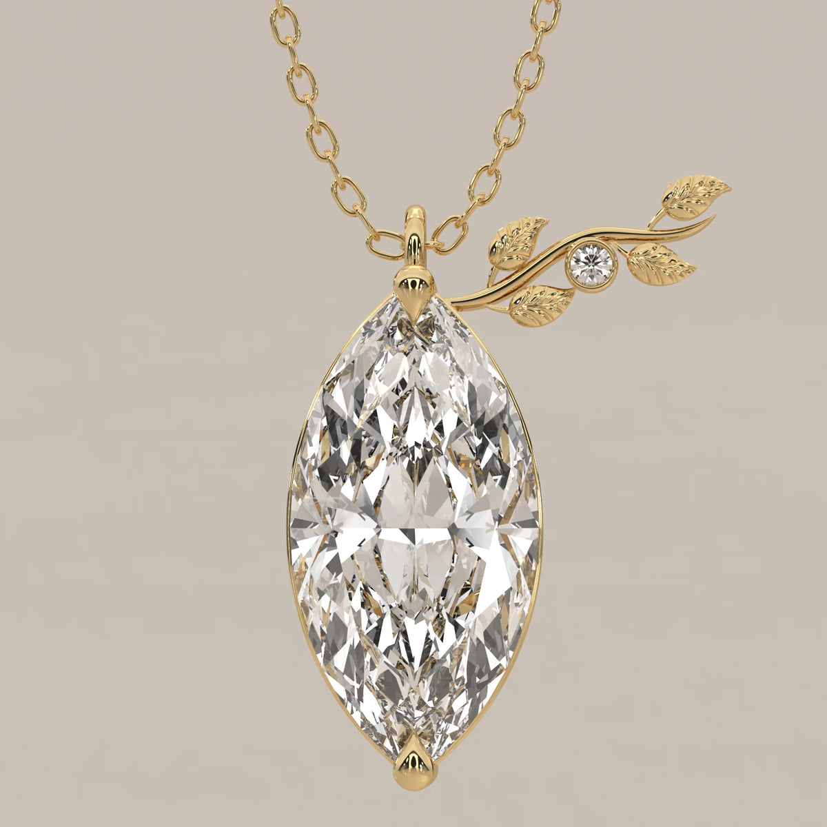 Marquise Lab Grown Diamond Pendant with Leafy Sprig Accent in yellow gold, shown on a plain background.