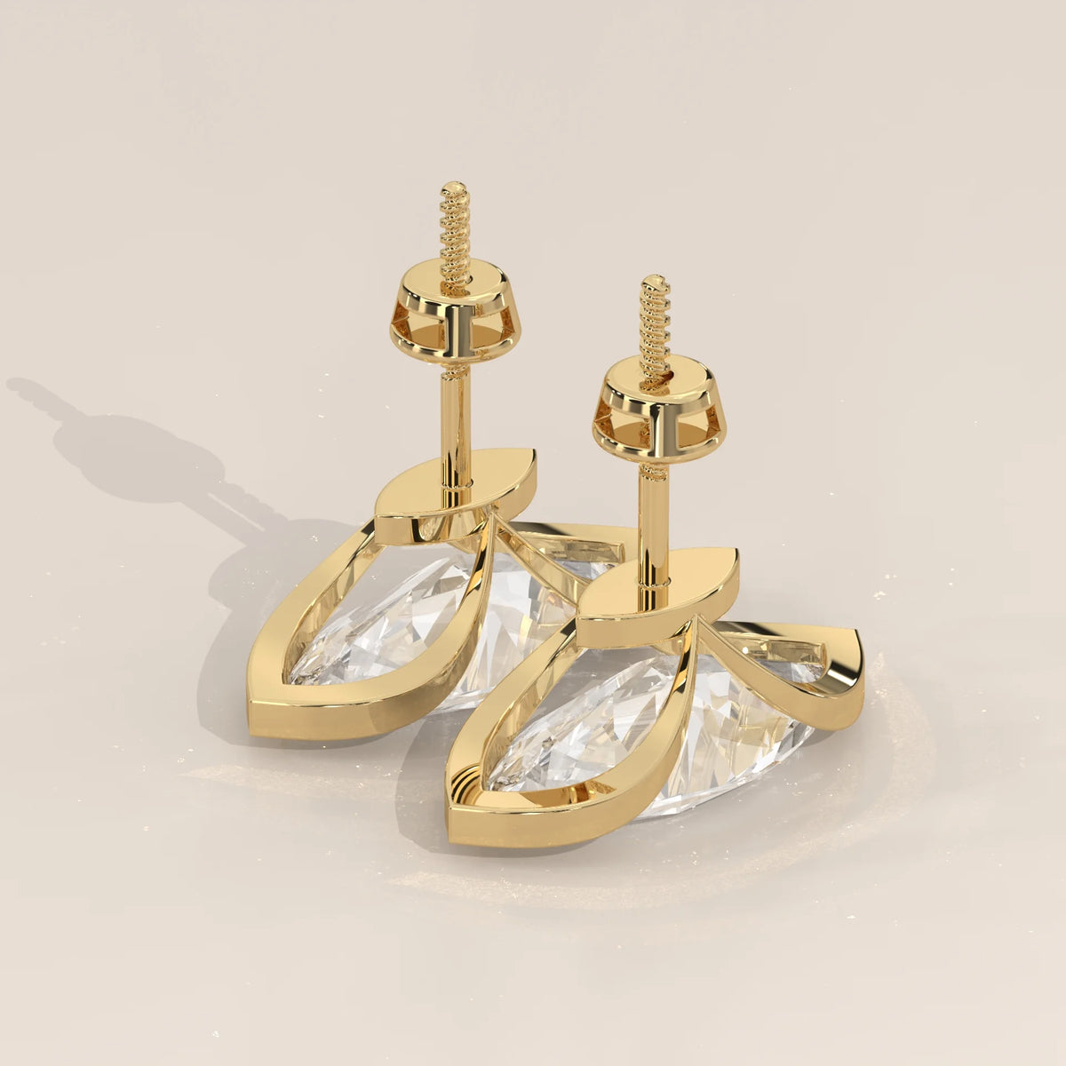 Marquise Lab Grown Diamond Studs with Pointed Tip Bezels in yellow gold, shown at an angle.