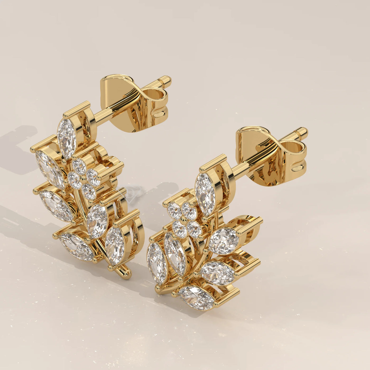 Three-Quarter View: Marquise Diamond Stud Earrings with Prong Setting in Yellow Gold – Lab Grown – Driona Jewels