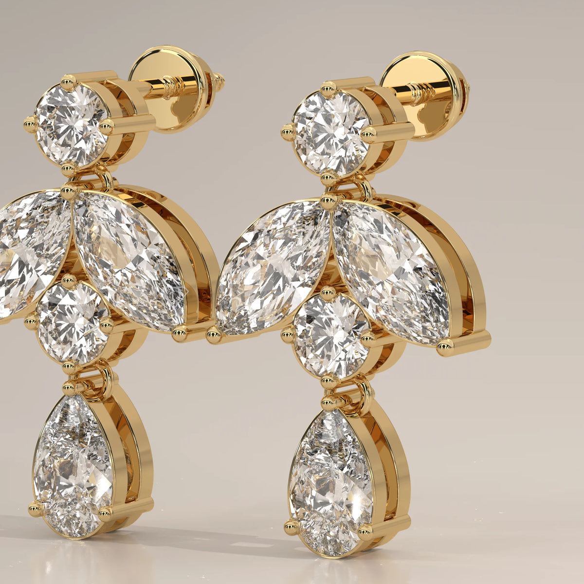 Marquise Leaf and Pear Lab Grown Diamond Drop Earrings in yellow gold, front view on a plain background.