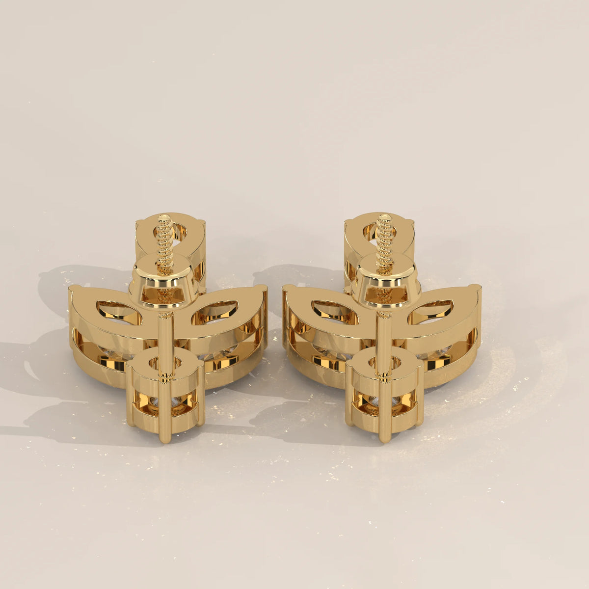 Marquise Leaf and Pear Lab Grown Diamond Drop Earrings in yellow gold, product photograph on a plain background.