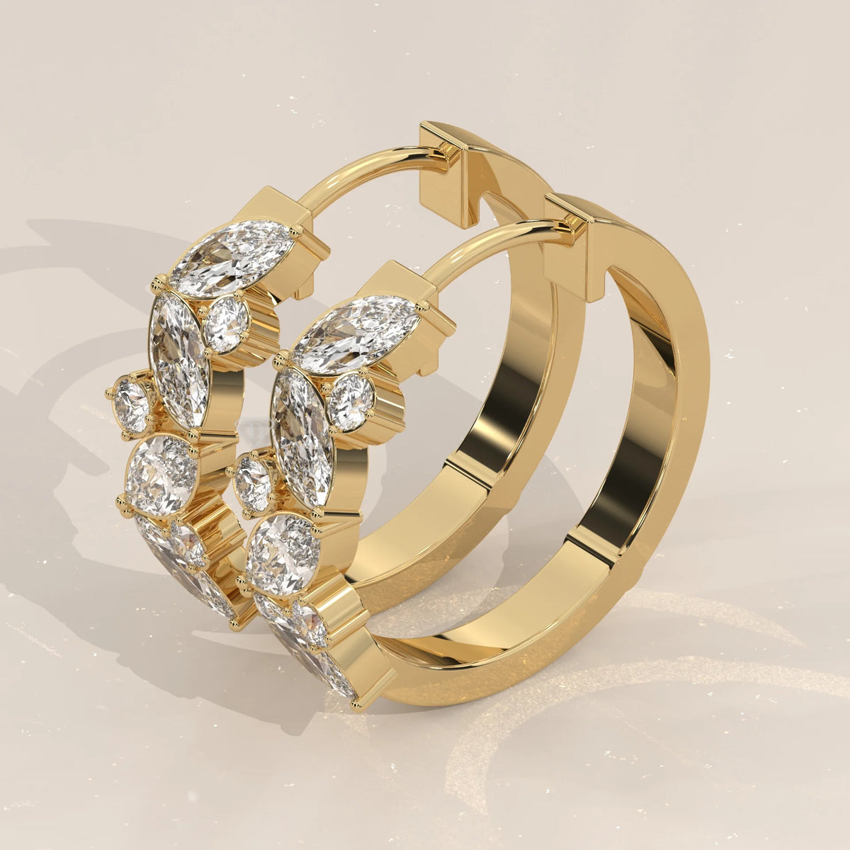 Marquise and Round Lab Grown Diamond Hoops in a Leaf Pattern in yellow gold, photographed head-on.