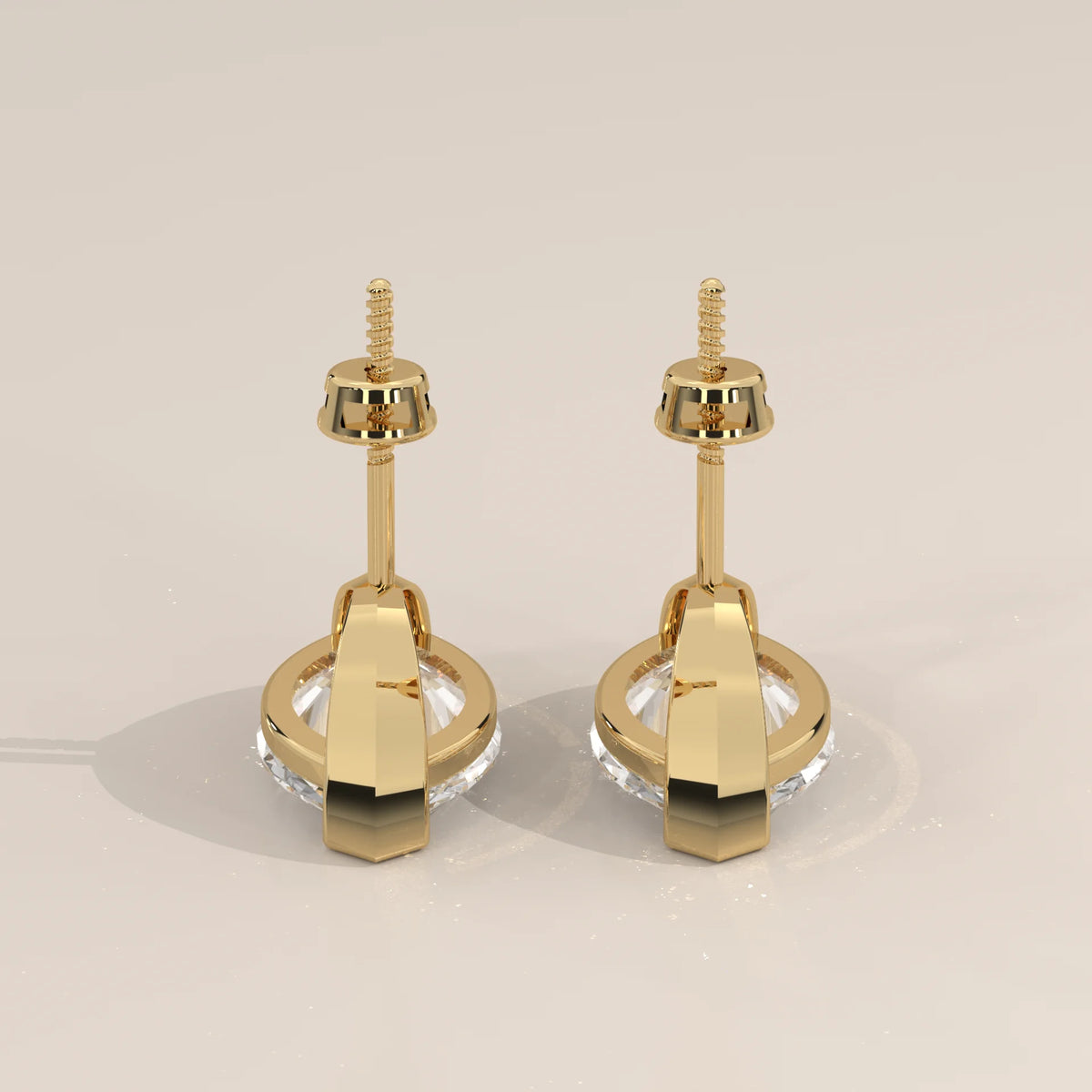 Marquise Solitaire Lab Grown Diamond Studs with V Tip Prongs in yellow gold, photographed at a three-quarter angle.