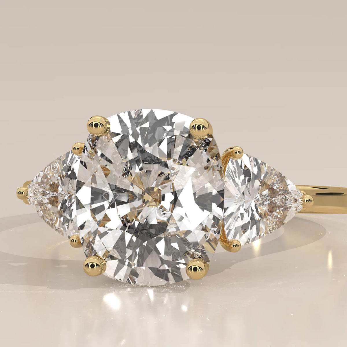 Mennie 5 Carat Cushion Lab Grown Diamond Ring, Trillion Sides in yellow gold, shown at an angle.