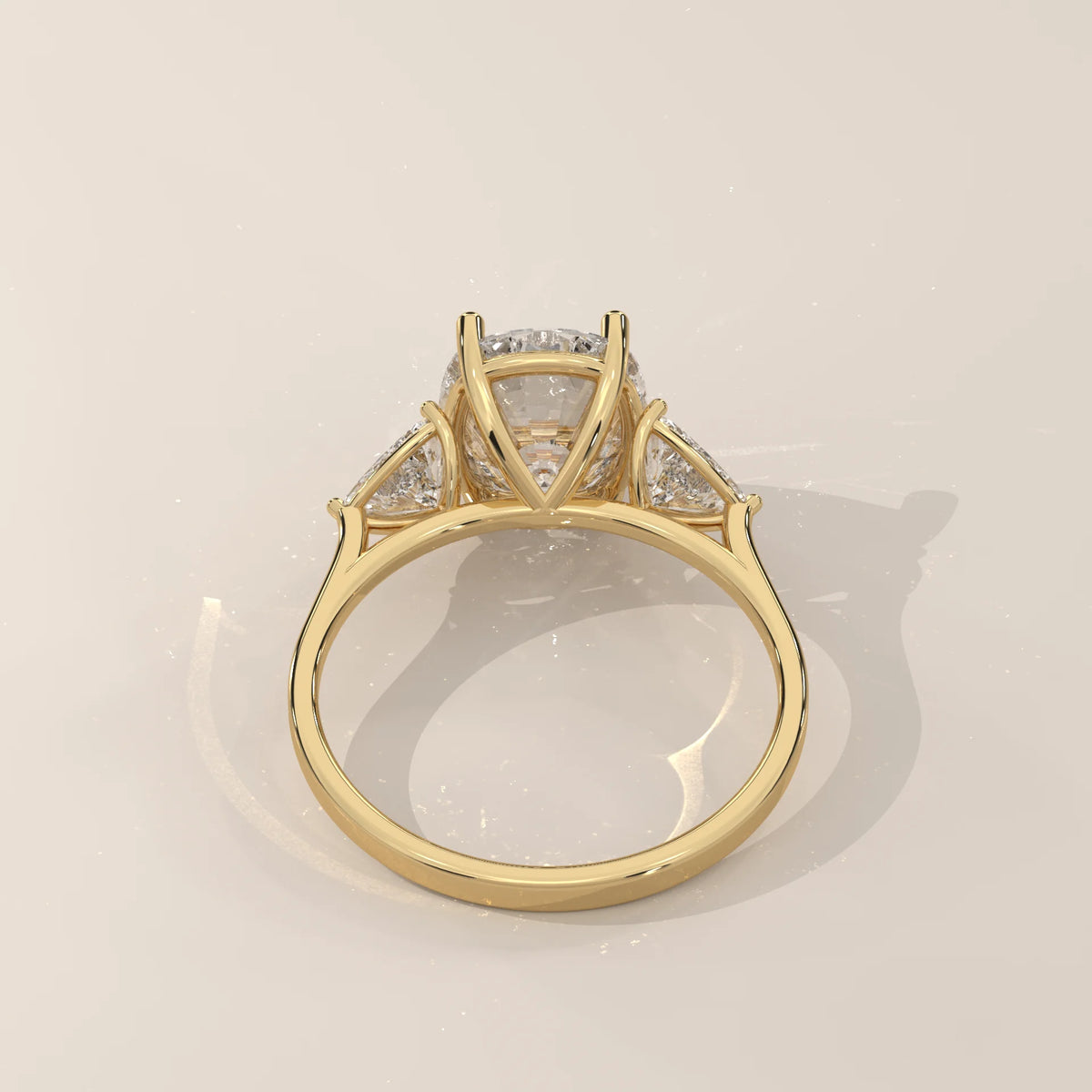 Mennie 5 Carat Cushion Lab Grown Diamond Ring, Trillion Sides in yellow gold, side profile view.