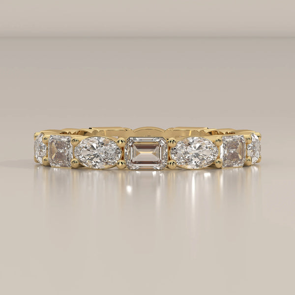 Side Profile: Emerald Cut Diamond Eternity Band with Eternity Setting in Yellow Gold – Lab Grown – Driona Jewels