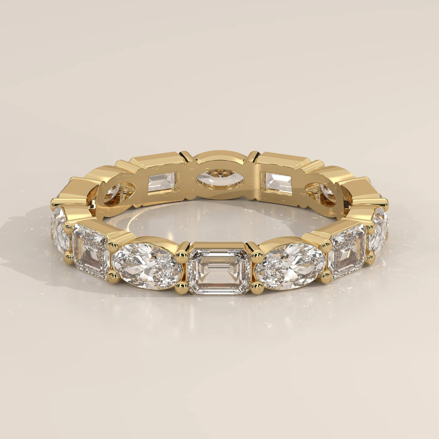 Three-Quarter View: Emerald Cut Diamond Eternity Band with Eternity Setting in Yellow Gold – Lab Grown – Driona Jewels