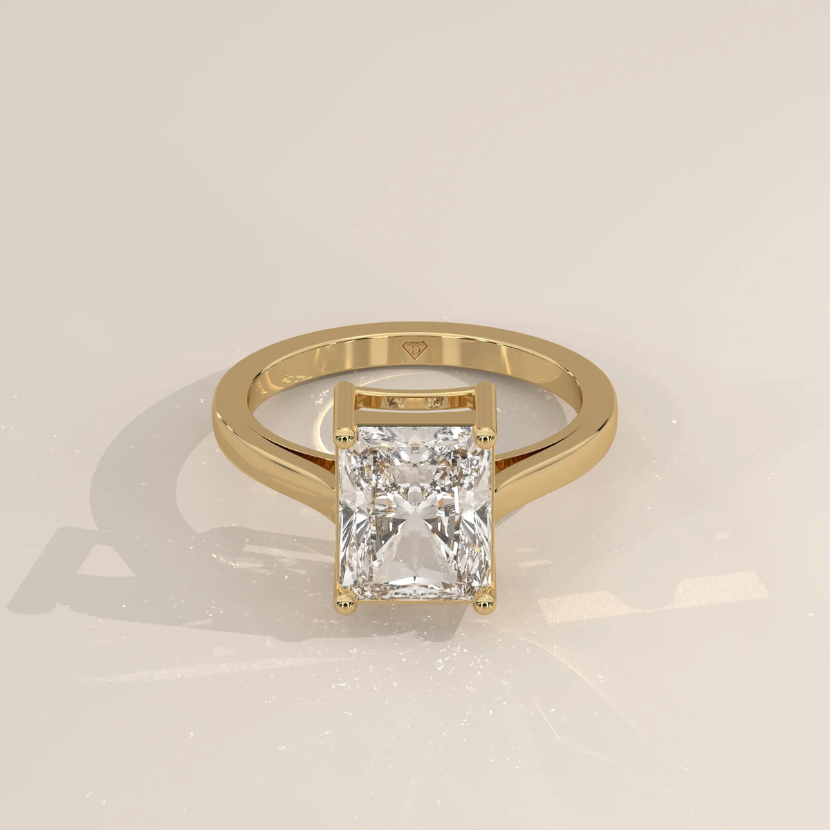 Nachel 5 Carat Radiant Lab Grown Diamond Solitaire Ring, Plain Band in yellow gold, shown from the front.
