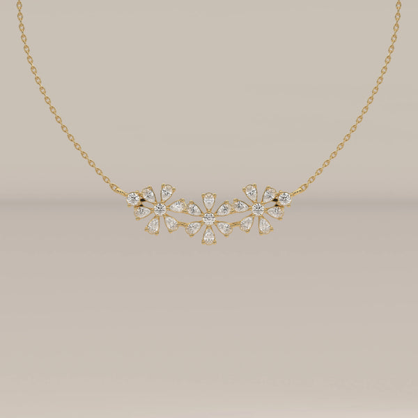 A floral lab grown diamond cluster pendant bar design in yellow gold, shown from the front.