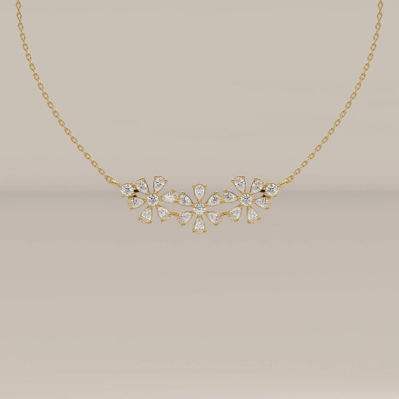 A floral lab grown diamond cluster pendant bar design in yellow gold, shown from the front.