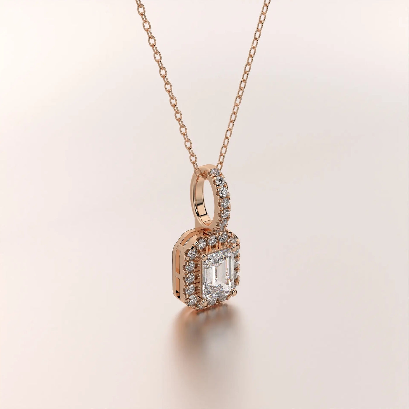 Three-quarter-view: Emerald Cut Diamond Necklace with Halo Setting in 14k Rose Gold - Lab Grown - Driona Jewels