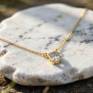 Close-up: Emerald Cut Diamond Necklace with Bezel Setting in 14k Gold - Lab Grown - Driona Jewels