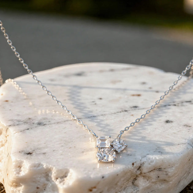 Close-up: Emerald Cut Diamond Necklace with Prong Setting in 14k White Gold - Lab Grown - Driona Jewels