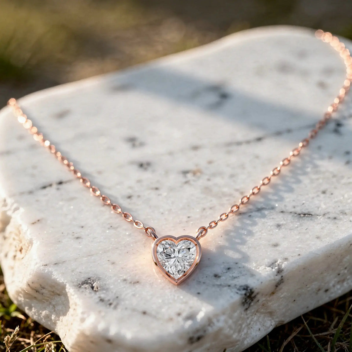 Close-up: Heart Diamond Necklace with Bezel Setting in 14k Rose Gold - Lab Grown - Driona Jewels