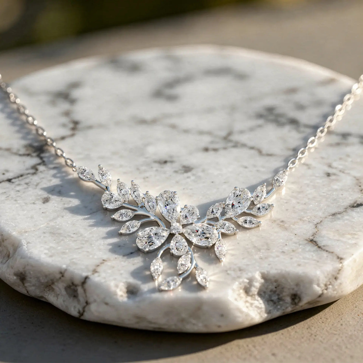 Flat Lay: Marquise Diamond Necklace with Floral Setting in 14k White Gold - Lab Grown - Driona Jewels