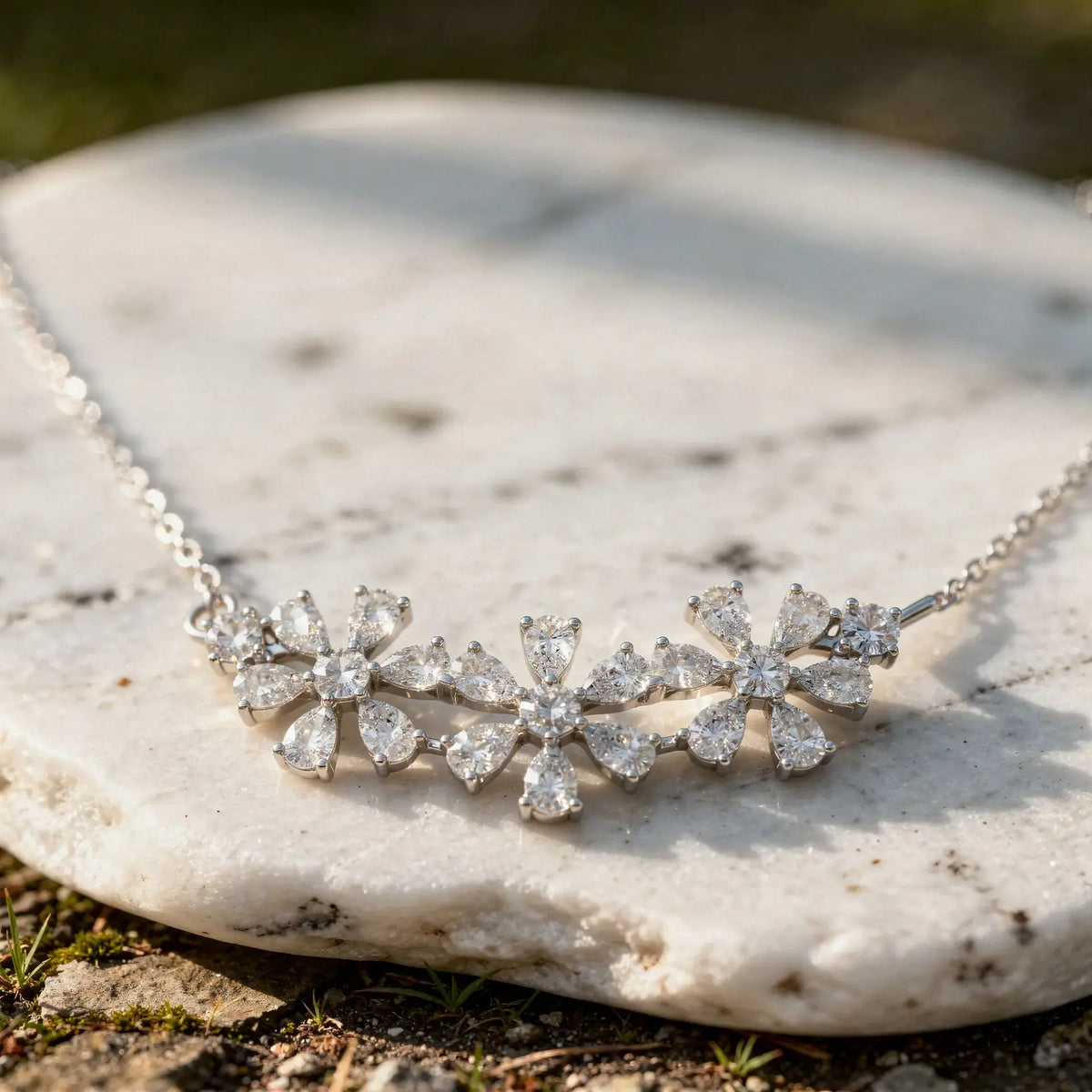 Close-up: Pear Cut Diamond Necklace with Flower Setting in 14k White Gold - Lab Grown - Driona Jewels