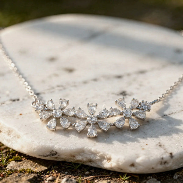 Close-up: Pear Cut Diamond Necklace with Flower Setting in 14k White Gold - Lab Grown - Driona Jewels