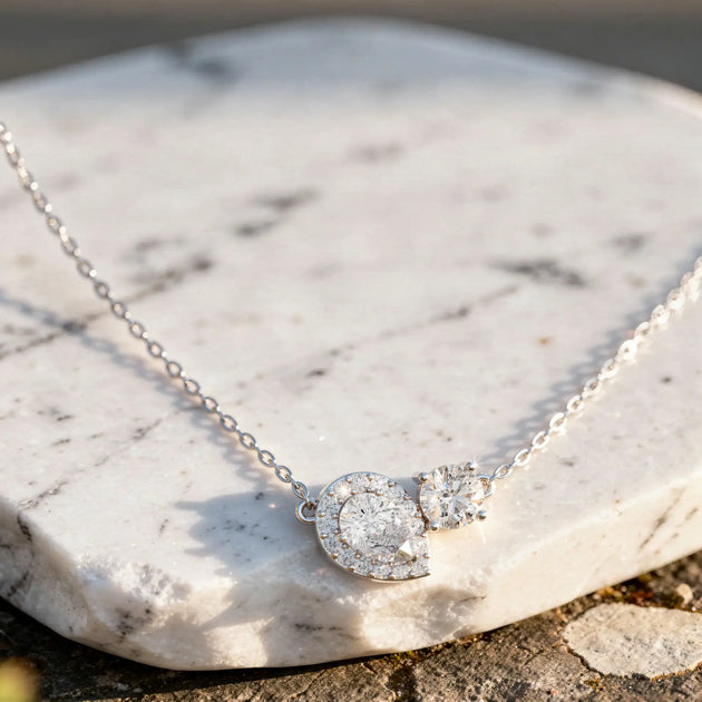 Close-up: Pear Cut Diamond Necklace with Halo Setting in 14k White Gold - Lab Grown - Driona Jewels
