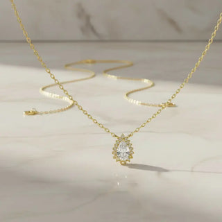 Flat Lay: Pear Cut Diamond Necklace with Halo Setting in 14k Yellow Gold - Lab Grown - Driona Jewels