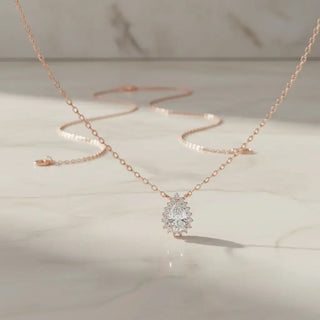 Flat Lay: Pear Cut Diamond Necklace with Solitaire Setting in 14k Rose Gold - Lab Grown - Driona Jewels