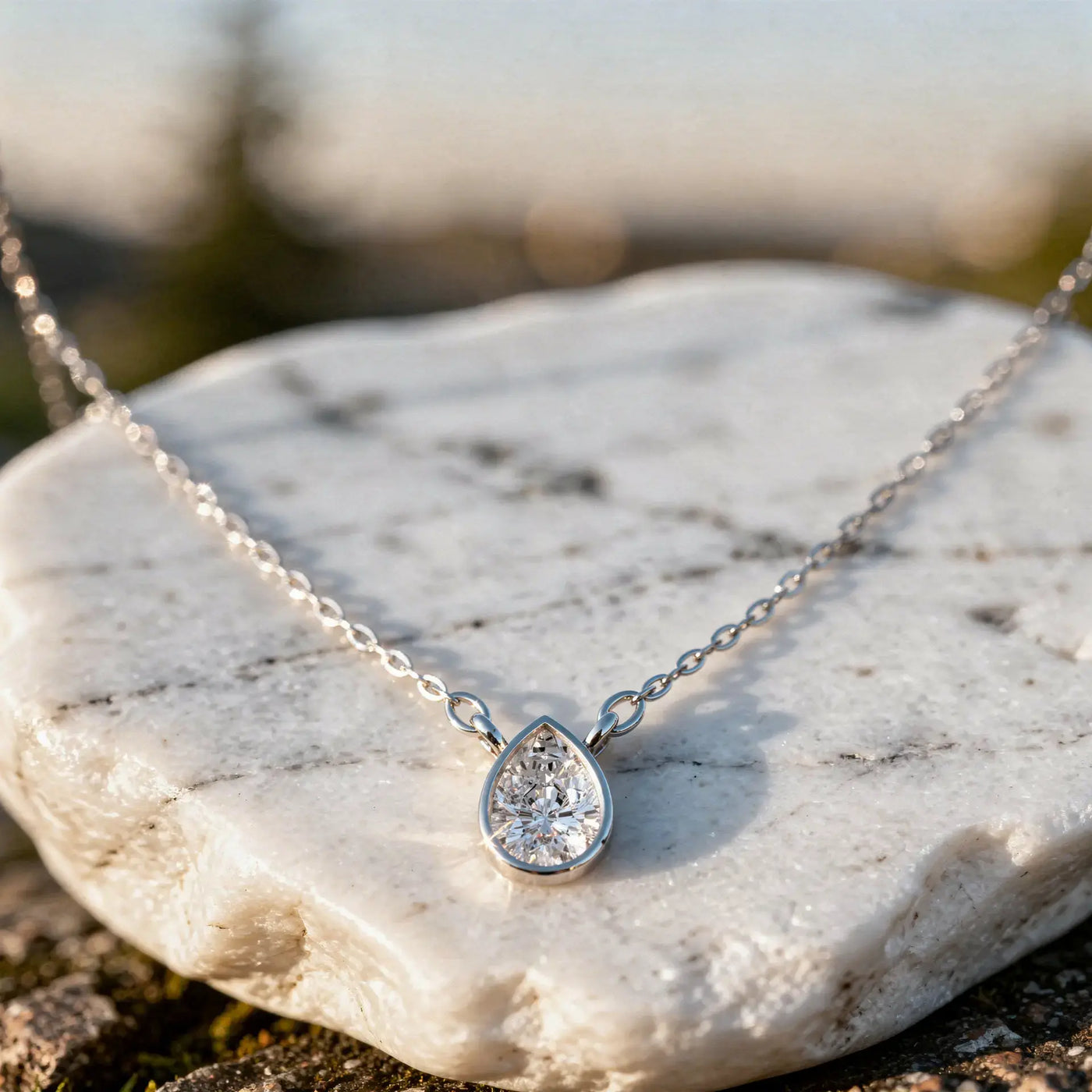 Close-up: Pear Diamond Necklace with Solitaire Setting in 14k White Gold - Lab Grown - Driona Jewels