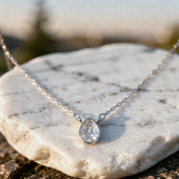 Close-up: Pear Diamond Necklace with Solitaire Setting in 14k White Gold - Lab Grown - Driona Jewels