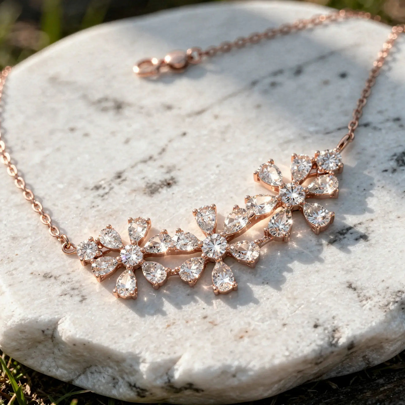 Flat Lay: Round Diamond Necklace with Floral Setting in 14k Rose Gold - Lab Grown - Driona Jewels